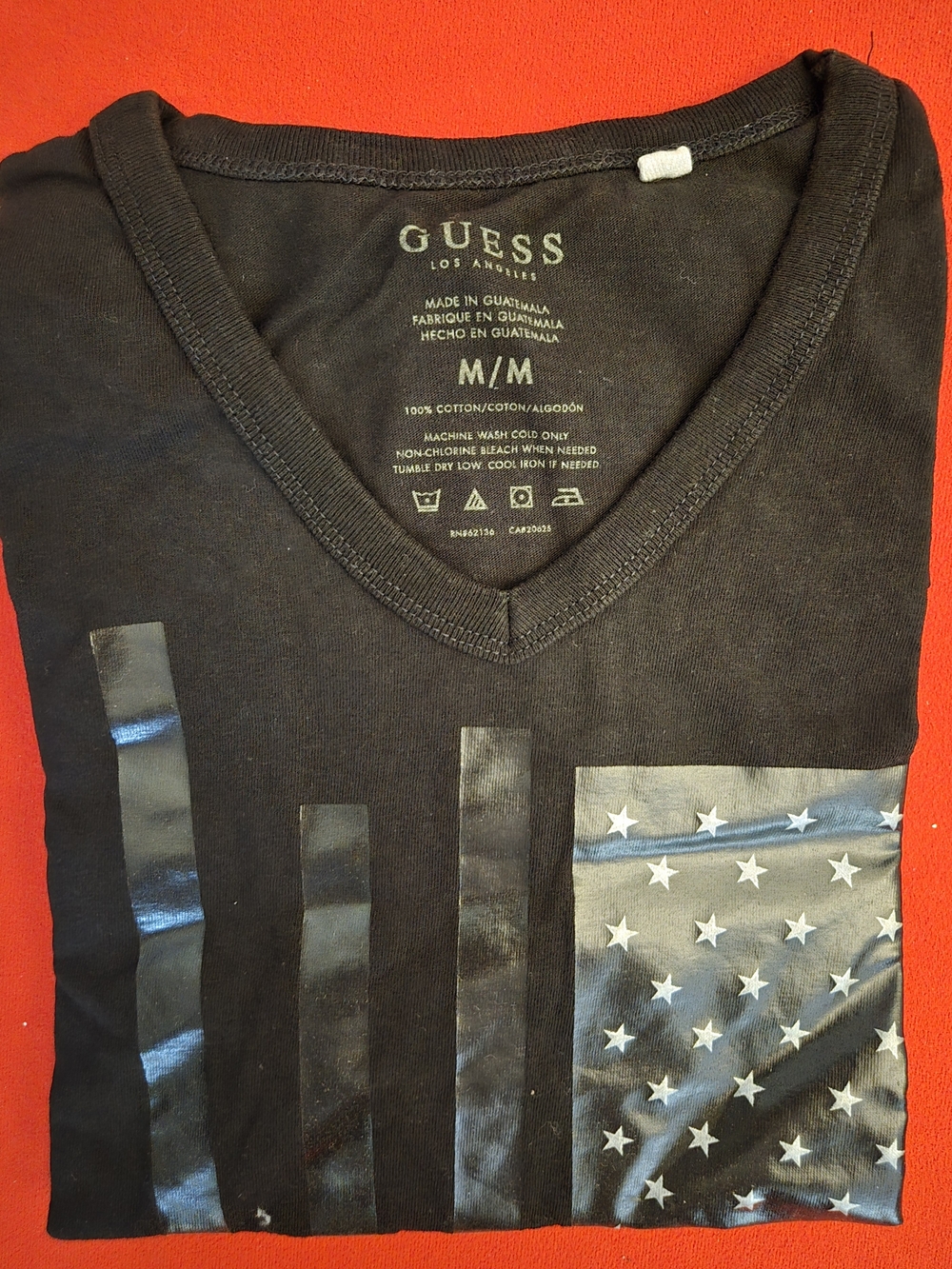 Guess Men's Black V-Neck Graphic Tee with Glossy Flag Detail